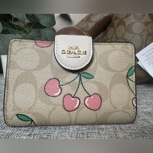 SOLD. $129 COACH Medium Corner Zip Wallet In Signature With Heart Cherry Print